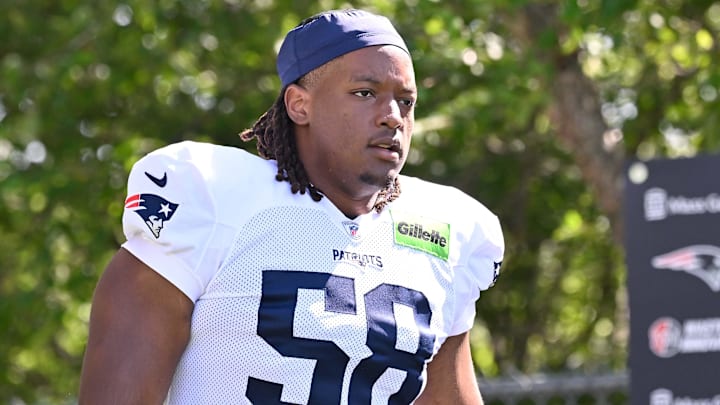 Jul 28, 2025; Foxborough, MA, USA; New England Patriots center Jared Wilson (58) heads to the practice fields for training camp at Gillette Stadium. Mandatory Credit: Eric Canha-Imagn Images
