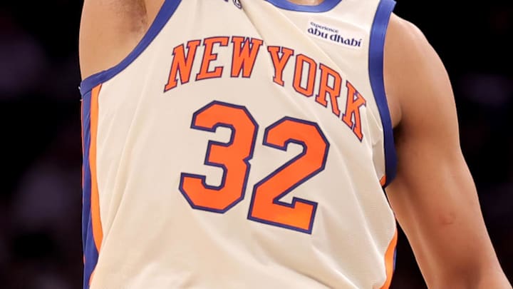 Mar 1, 2026; New York, New York, USA; New York Knicks center Karl-Anthony Towns (32) reacts after missing a three point shot against the San Antonio Spurs during the second quarter at Madison Square Garden. Mandatory Credit: Brad Penner-Imagn Images