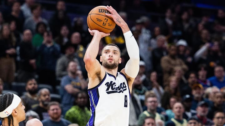 Mar 31, 2025; Indianapolis, Indiana, USA; Sacramento Kings guard Zach Lavine (8) shoots the ball while Indiana Pacers guard Andrew Nembhard (2) defends in the second half at Gainbridge Fieldhouse. Mandatory Credit: Trevor Ruszkowski-Imagn Images