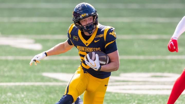 Oct 17, 2026; Morgantown, West Virginia, USA;  West Virginia Mountaineers wide receiver Cyrus Traugh (86) makes a catch and runs for extra yards during the second quarter against the Cincinnati Bearcats at Milan Puskar Stadium.  Mandatory Credit: Ben Queen-Imagn Images