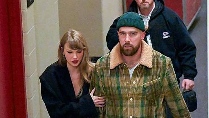 Taylor Swift and Travis Kelce leaving a venue together. Taylor Swift and Travis Kelce leaving a venue together.