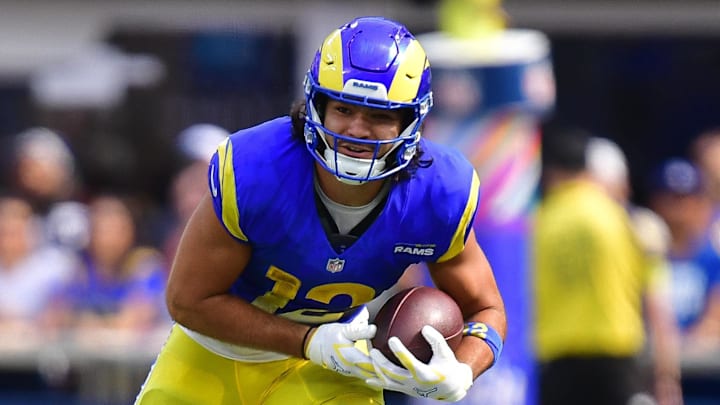 Sep 28, 2025; Inglewood, California, USA; Los Angeles Rams wide receiver Puka Nacua (12) runs the ball against the Indianapolis Colts during the second half at SoFi Stadium. Mandatory Credit: Gary A. Vasquez-Imagn Images