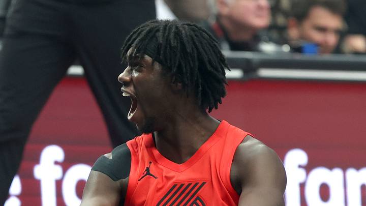 Portland Trail Blazers guard Sidy Cissoko reacts after a play against the San Antonio Spurs in the first half at Moda Center.