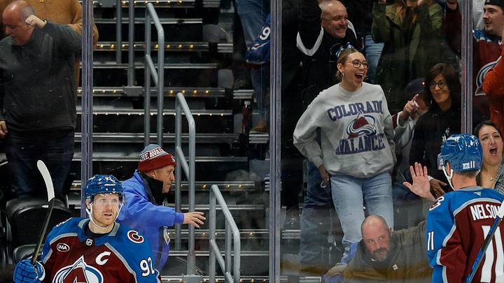 Dec 11, 2025; Denver, Colorado, USA; Colorado Avalanche left wing Gabriel Landeskog (92) celebrates his goal with center Brock Nelson (11) in the third period against the Florida Panthers at Ball Arena. Mandatory Credit: Isaiah J. Downing-Imagn Images