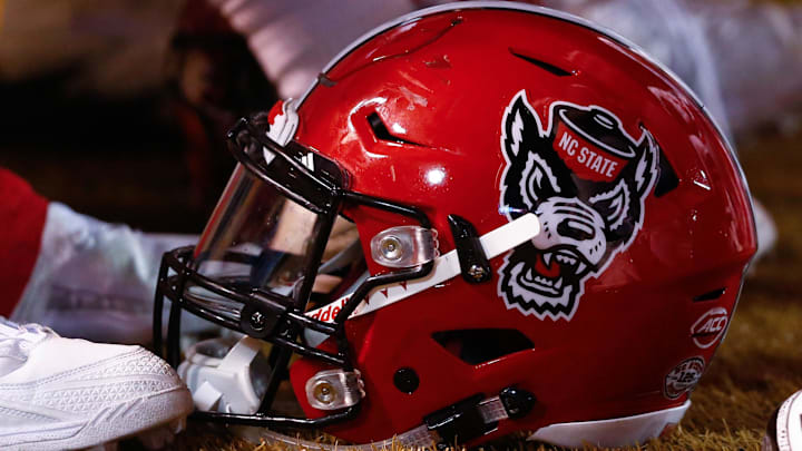 Nov 18, 2017; Winston-Salem, NC, USA; A North Carolina State Wolfpack helmet lies on the sidelines during the game against the Wake Forest Demon Deacons at BB& T Field. Mandatory Credit: Jeremy Brevard-Imagn Images