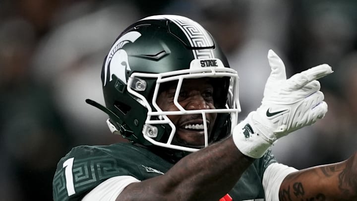 Nov 29, 2025; Detroit, Michigan, USA; Michigan State wide receiver Omari Kelly (1) celebrates a run for a first down against Maryland in the second quarter at Ford Field. Mandatory Credit: Brendan Mullin-Imagn Images