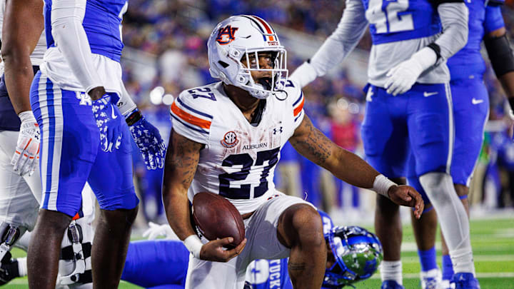 One of the few times Auburn's Jarquez Hunter was spotted on the ground after rushing for 278 yards against Kentucky.