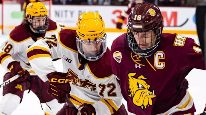 UMD senior defensemanJoey Pierce (right) makes a play against Minnesota's Erik Pahlsson on Oct. 25, 2025. The Bulldogs won 4-1.