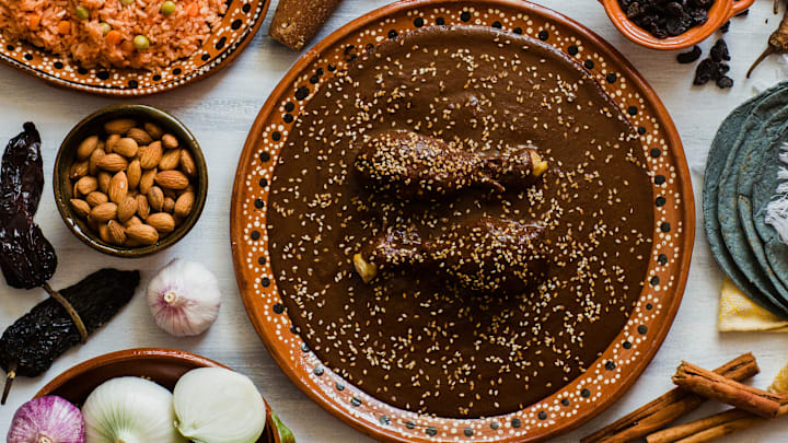 Before mole poblano was a modern comfort food, the rich, spice-laden sauce was a sacred, labor-intensive tribute to the gods.