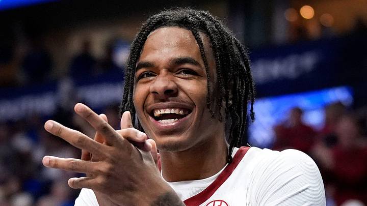 Alabama guard Labaron Philon (0) reacts on the bench late in the second half of their Southeastern Conference tournament quarterfinal victory against Kentucky at Bridgestone Arena in Nashville, Tenn., Friday, March 14, 2025.