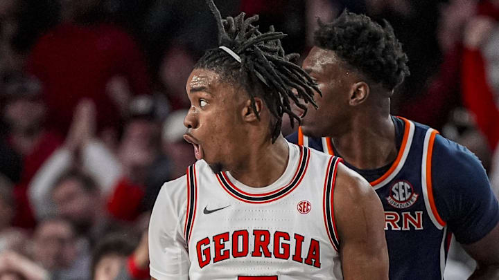 Georgia Bulldogs guard Jeremiah Wilkinson (5) reacts after making a three point shot against the Auburn Tigers during overtime at Stegeman Coliseum. 