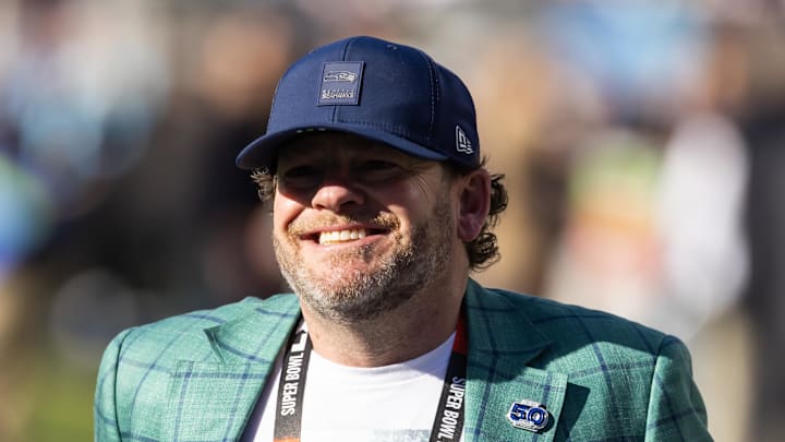 Seattle Seahawks general manager John Schneider looks on