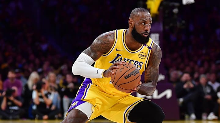 Apr 30, 2025; Los Angeles, California, USA; Los Angeles Lakers forward LeBron James (23) controls the ball against the Minnesota Timberwolves during the first half in game five of first round for the 2025 NBA Playoffs at Crypto.com Arena. Mandatory Credit: Gary A. Vasquez-Imagn Images