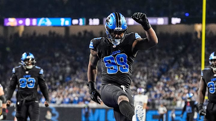 Detroit Lions defensive end Za'Darius Smith (99) celebrates a sack against Minnesota Vikings 