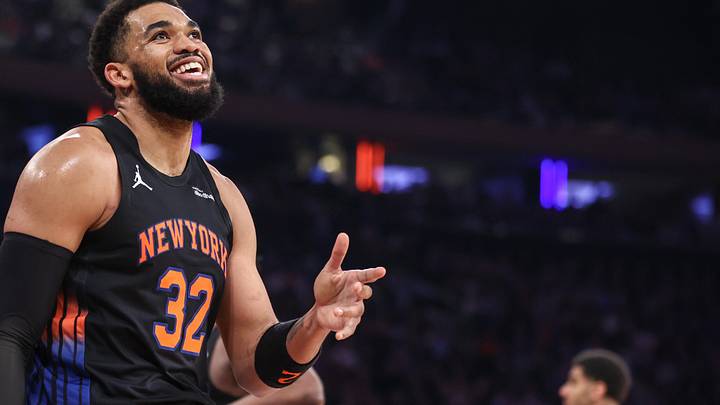 Knicks center Karl-Anthony Towns reacts after getting called for a foul against the 76ers.