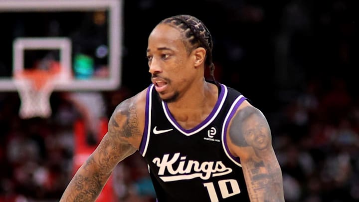 Dec 3, 2025; Houston, Texas, USA; Sacramento Kings guard DeMar DeRozan (10) handles the ball against the Houston Rockets during the third quarter at Toyota Center. Dec 3, 2025; Houston, Texas, USA; Sacramento Kings guard DeMar DeRozan (10) handles the ball against the Houston Rockets during the third quarter at Toyota Center.