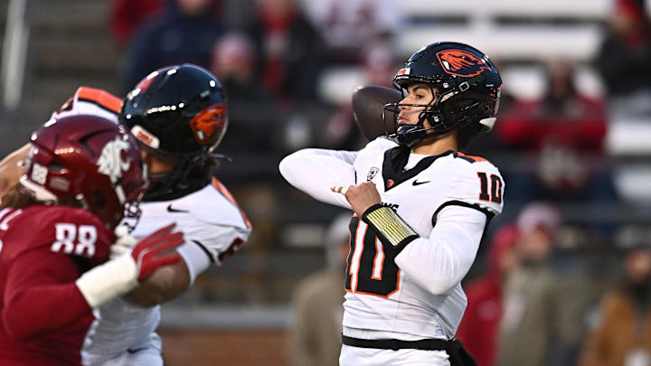 Nov 29, 2025; Pullman, Washington, USA; Oregon State Beavers quarterback Tristan Ti'A (10) throws a pass against the Washington State Cougars in the first half at Gesa Field at Martin Stadium. Mandatory Credit: James Snook-Imagn Images