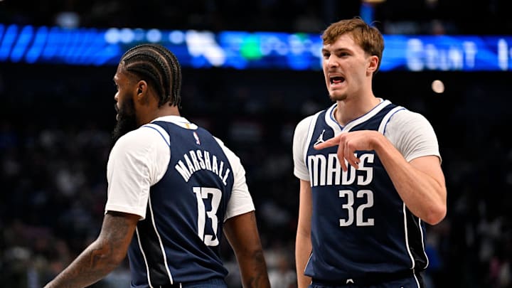 Dec 18, 2025; Dallas, Texas, USA; Dallas Mavericks forward Naji Marshall (13) and forward Cooper Flagg (32) look during the game between the Pistons and Mavericks at the American Airlines Center. Mandatory Credit: Jerome Miron-Imagn Images