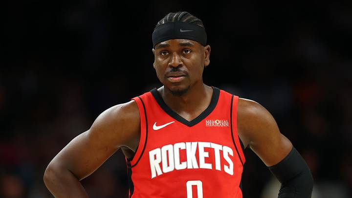 Apr 7, 2026; Phoenix, Arizona, USA; Houston Rockets guard Aaron Holiday (0) against the Phoenix Suns at Mortgage Matchup Center. Mandatory Credit: Mark J. Rebilas-Imagn Images