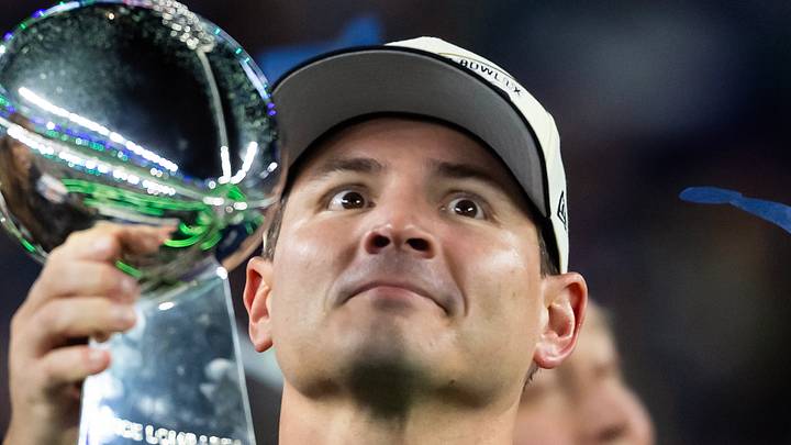 Seattle Seahawks head coach Mike Macdonald celebrates with the Vince Lombardi Trophy