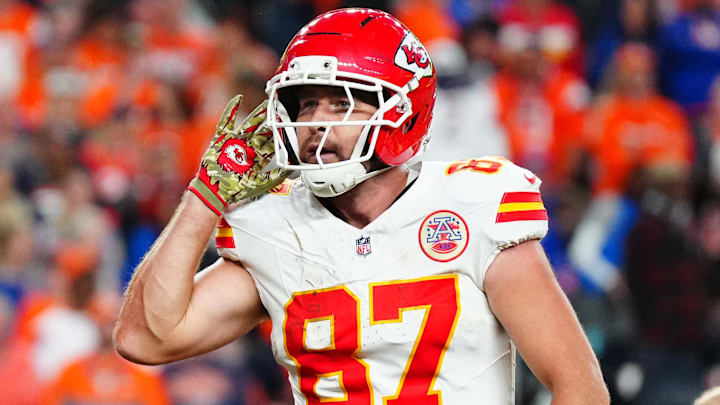 Nov 16, 2025; Denver, Colorado, USA; Kansas City Chiefs tight end Travis Kelce (87) reacts after his touchdown in the fourth quarter against the Denver Broncos at Empower Field at Mile High. Mandatory Credit: Ron Chenoy-Imagn Images