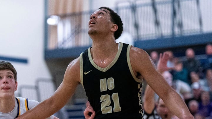 Neumann-Goretti's Alassan N'Diaye prepares for a rebound ball during a PIAA boys basketball state championship semifinal in Pottstown, Pa. on Friday, March 21, 2025. Goretti's boys and girls teams are among eight Philadelphia Catholic League programs playing for PIAA state titles this weekend.