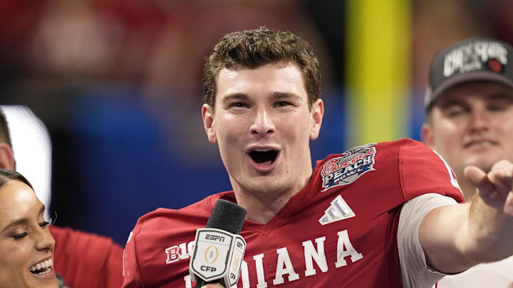 Jan 9, 2026; Atlanta, GA, USA; Indiana Hoosiers quarterback Fernando Mendoza (15) reacts after the 2025 Peach Bowl and semifinal game of the College Football Playoff at Mercedes-Benz Stadium. Mandatory Credit: Dale Zanine-Imagn Images