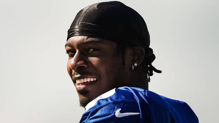 Indianapolis Colts linebacker Akeem Davis-Gaither walks up the field