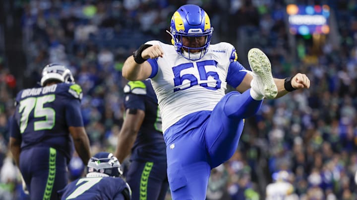Nov 3, 2024; Seattle, Washington, USA; Los Angeles Rams defensive tackle Braden Fiske (55) celebrates following a sack against Seattle Seahawks quarterback Geno Smith (7) during the fourth quarter at Lumen Field. Mandatory Credit: Joe Nicholson-Imagn Images