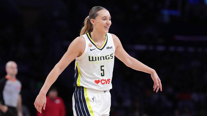 Jun 5, 2026; Los Angeles, California, USA; Dallas Wings guard Paige Bueckers (5) reacts in the first half against the LA Sparks at Crypto.com Arena. Mandatory Credit: Kirby Lee-Imagn Images