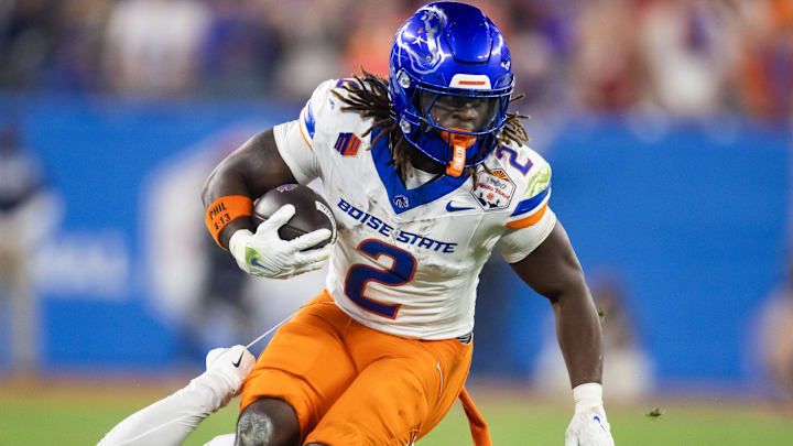 Dec 31, 2024; Glendale, AZ, USA; Boise State Broncos running back Ashton Jeanty (2) against the Penn State Nittany Lions during the Fiesta Bowl at State Farm Stadium. Mandatory Credit: Mark J. Rebilas-Imagn Images