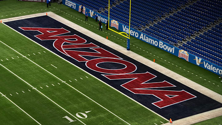 Dec 28, 2023; San Antonio, TX, USA; The Arizona Wildcats logo in the end zone at Alamodome. Mandatory Credit: Kirby Lee-Imagn Images Dec 28, 2023; San Antonio, TX, USA; The Arizona Wildcats logo in the end zone at Alamodome. Mandatory Credit: Kirby Lee-Imagn Images