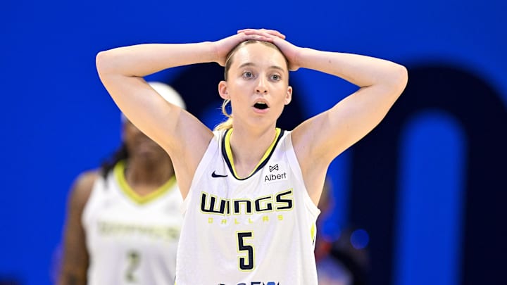 Sep 11, 2025; Arlington, Texas, USA; Dallas Wings guard Paige Bueckers (5) reacts to a call during the first half against the Phoenix Mercury at College Park Center. Mandatory Credit: Jerome Miron-Imagn Images