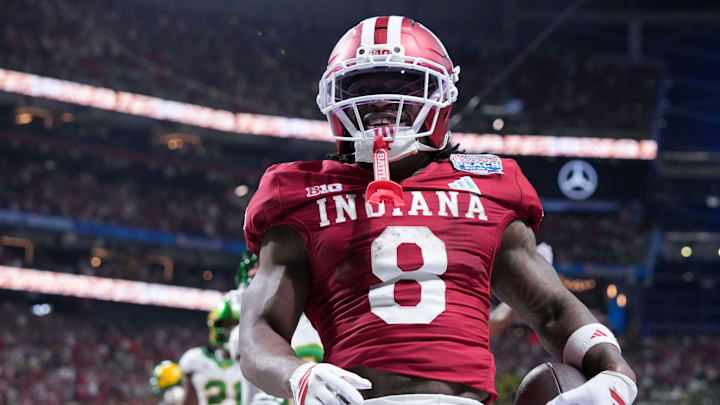 Indiana Hoosiers running back Kaelon Black (8) celebrates after scoring a touchdown against Oregon. Indiana Hoosiers running back Kaelon Black (8) celebrates after scoring a touchdown against Oregon.