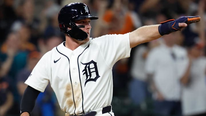Apr 14, 2026; Detroit, Michigan, USA;  Detroit Tigers shortstop Kevin McGonigle (7) celebrates after he dives in safe at home in the eighth inning against the Kansas City Royals at Comerica Park. Mandatory Credit: Rick Osentoski-Imagn Images