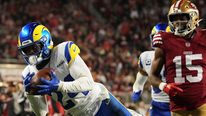 Dec 12, 2024; Santa Clara, California, USA; Los Angeles Rams cornerback Darious Williams (24) intercepts the pass intended for San Francisco 49ers wide receiver Jauan Jennings (15) during the fourth quarter at Levi's Stadium. Mandatory Credit: Kelley L Cox-Imagn Images Dec 12, 2024; Santa Clara, California, USA; Los Angeles Rams cornerback Darious Williams (24) intercepts the pass intended for San Francisco 49ers wide receiver Jauan Jennings (15) during the fourth quarter at Levi's Stadium. Mandatory Credit: Kelley L Cox-Imagn Images
