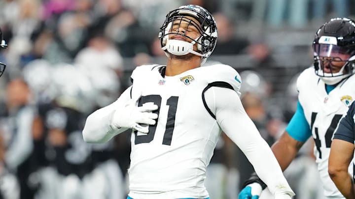 Dec 22, 2024; Paradise, Nevada, USA; Jacksonville Jaguars defensive end Arik Armstead (91) celebrates after sacking Las Vegas Raiders quarterback Aidan O'Connell (12) during the first quarter at Allegiant Stadium. Mandatory Credit: Stephen R. Sylvanie-Imagn Images Dec 22, 2024; Paradise, Nevada, USA; Jacksonville Jaguars defensive end Arik Armstead (91) celebrates after sacking Las Vegas Raiders quarterback Aidan O'Connell (12) during the first quarter at Allegiant Stadium. Mandatory Credit: Stephen R. Sylvanie-Imagn Images