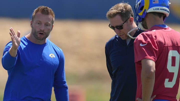 May 23, 2022; Thousand Oaks, CA, USA; Los Angeles Rams coach Sean McVay (left), offensive coordinator Liam Coen (center) and quarterback Matthew Stafford (9) during organized team activities at California Lutheran University. Mandatory Credit: Kirby Lee-Imagn Images May 23, 2022; Thousand Oaks, CA, USA; Los Angeles Rams coach Sean McVay (left), offensive coordinator Liam Coen (center) and quarterback Matthew Stafford (9) during organized team activities at California Lutheran University. Mandatory Credit: Kirby Lee-Imagn Images