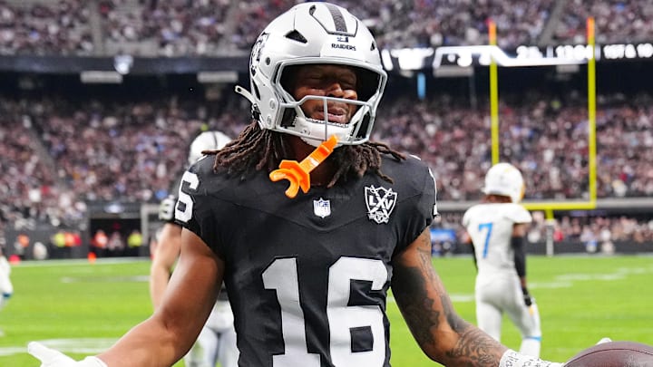 Jan 5, 2025; Paradise, Nevada, USA; Las Vegas Raiders wide receiver Jakobi Meyers (16) celebrates after scoring a touchdown against the Los Angeles Chargers during the second quarter at Allegiant Stadium. Mandatory Credit: Stephen R. Sylvanie-Imagn Images