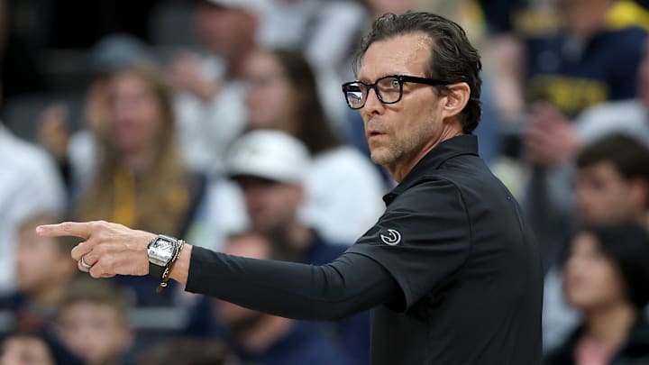 Atlanta Hawks head coach Quin Snyder calls a set against the Denver Nuggets.