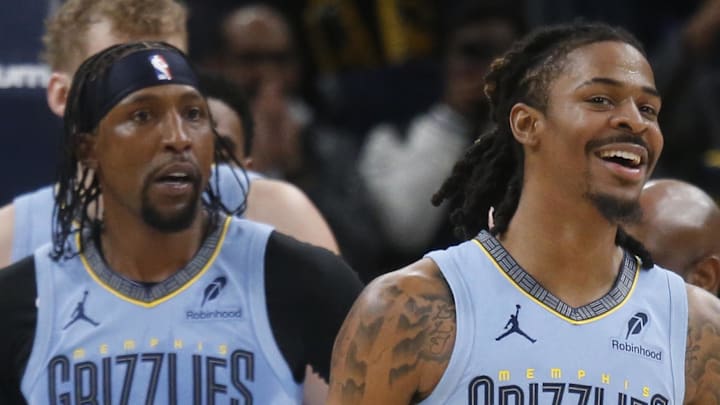 Jan 21, 2026; Memphis, Tennessee, USA; Memphis Grizzlies guard Ja Morant (12) reacts after having to be separated from Atlanta Hawks forward Mouhamed Gueye (18) after an altercation during the second quarter at FedExForum. Mandatory Credit: Petre Thomas-Imagn Images