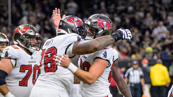 Oct 13, 2024; New Orleans, Louisiana, USA; Tampa Bay Buccaneers tight end Cade Otton (88) celebrates a touchdown against the New Orleans Saints during the fourth quarter at Caesars Superdome. Mandatory Credit: Matthew Hinton-Imagn Images