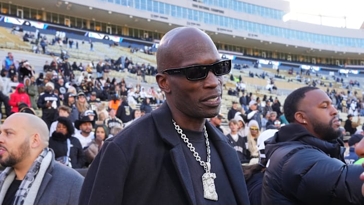 Nov 16, 2024; Boulder, Colorado, USA; Retired American football player Chad Johnson on the sidelines before the game between the Utah Utes against the Colorado Buffaloes at Folsom Field. Mandatory Credit: Ron Chenoy-Imagn Images
