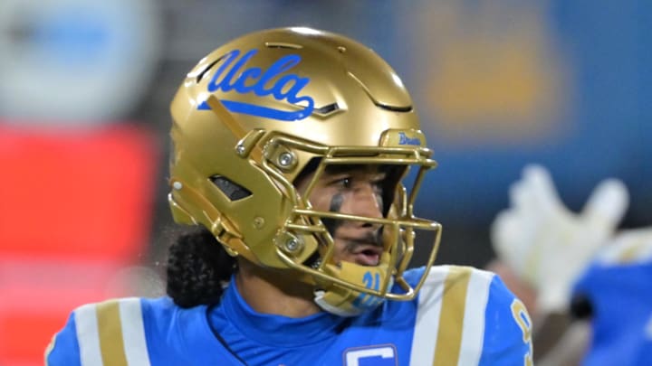 Nov 22, 2025; Pasadena, California, USA;  UCLA Bruins quarterback Nico Iamaleava (9) sets to pass the ball during the first half against the Washington Huskies at the Rose Bowl. Mandatory Credit: Jayne Kamin-Oncea-Imagn Images