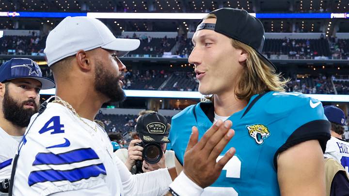 Aug 12, 2023; Arlington, Texas, USA;  Dallas Cowboys quarterback Dak Prescott (4) greets Jacksonville Jaguars quarterback Trevor Lawrence (16) after the game at AT&T Stadium. Mandatory Credit: Kevin Jairaj-USA TODAY Sports