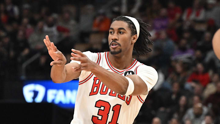 Feb 5, 2026; Toronto, Ontario, CAN;  Chicago Bulls guard Jaden Ivey (31) passes against the Toronto Raptors in the second half at Scotiabank Arena. Mandatory Credit: Dan Hamilton-Imagn Images