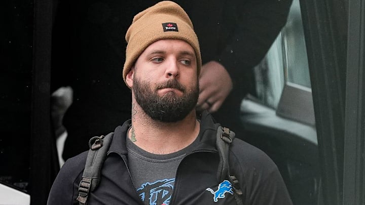 Detroit Lions offensive tackle Taylor Decker (68) walks off the bus as the team arrive at Lambeau Field in Green Bay, Wisconsin