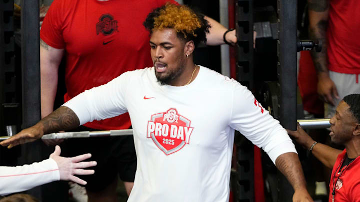 Ohio State Buckeyes offensive lineman Josh Simmons gets high fives after lifting during the pro day for NFL scouts at the Woody Hayes Athletic Cente on March 26, 2025.