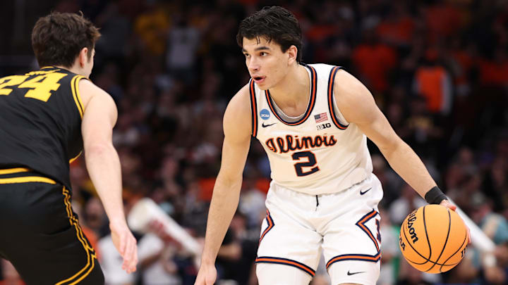 Mar 28, 2026; Houston, TX, USA; Illinois Fighting Illini guard Andrej Stojakovic (2) controls the ball against Iowa Hawkeyes guard Tate Sage (24) in the first half during the Elite Eight.