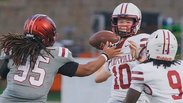 Prattville's Will McKay (10) passes under pressure from Stanhope Elmore's Jordan Watters (95) during their game at 17 Springs in Millbrook, Ala., on Friday August 28, 2026. Prattville's Will McKay (10) passes under pressure from Stanhope Elmore's Jordan Watters (95) during their game at 17 Springs in Millbrook, Ala., on Friday August 28, 2026.